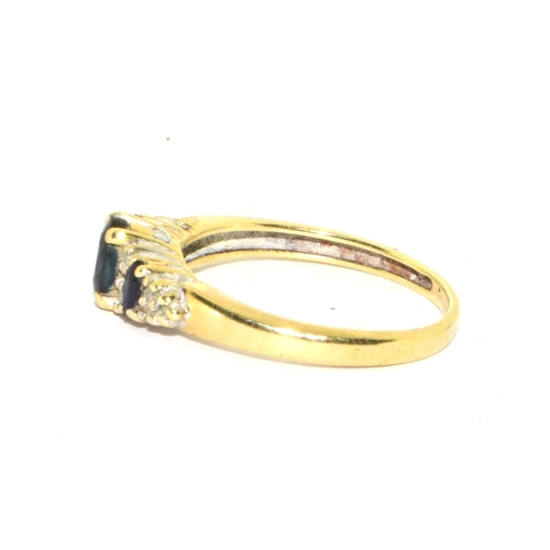 121 - 9ct gold ladies Diamond and sapphire graduated ring size O