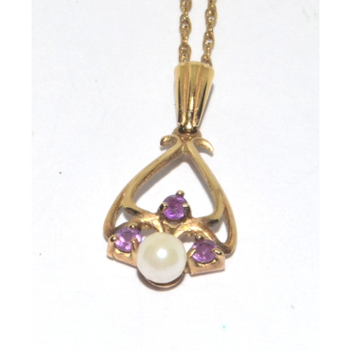 128 - 9ct gold Amethyst and seed pearl twist pearl  pendant necklace on a 9ct gold chain of 48cm