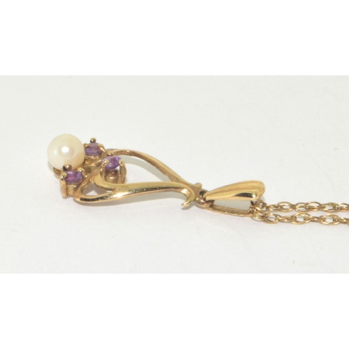 128 - 9ct gold Amethyst and seed pearl twist pearl  pendant necklace on a 9ct gold chain of 48cm