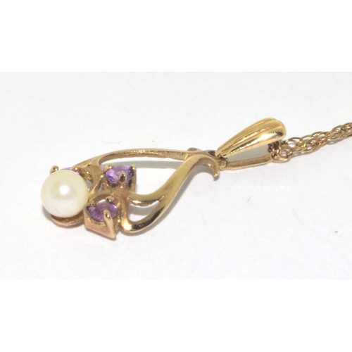 128 - 9ct gold Amethyst and seed pearl twist pearl  pendant necklace on a 9ct gold chain of 48cm