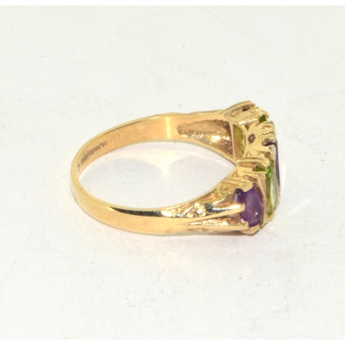 135 - 9ct gold ladies Amethyst and Peridot 5 stone ring size O