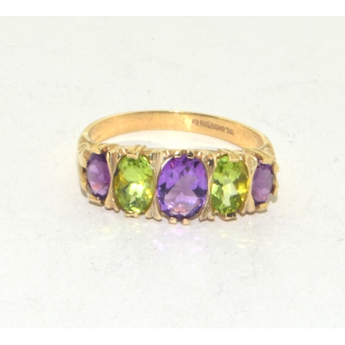 135 - 9ct gold ladies Amethyst and Peridot 5 stone ring size O