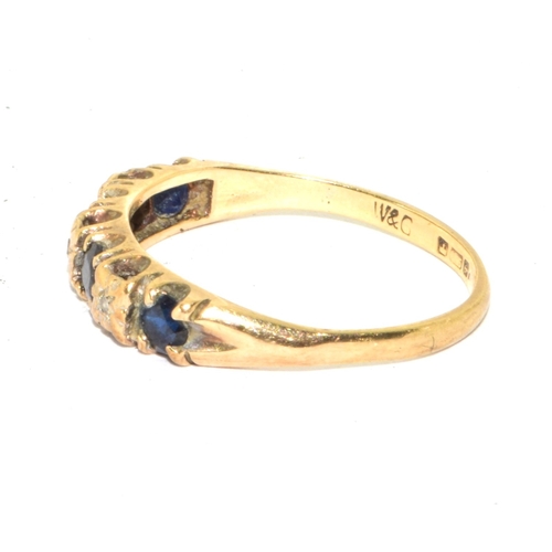 136 - 9ct gold ladies vintage 7 stone Diamond and Sapphire ring in a scroll setting size P