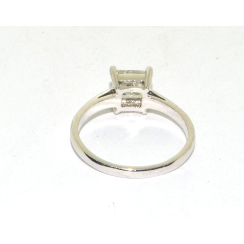 143 - 18ct white gold emerald cut diamond solitaire ring of approx 1ct size M