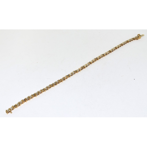 193 - 9ct gold Diamond and Sapphire line bracelet 20cm long 6.7g