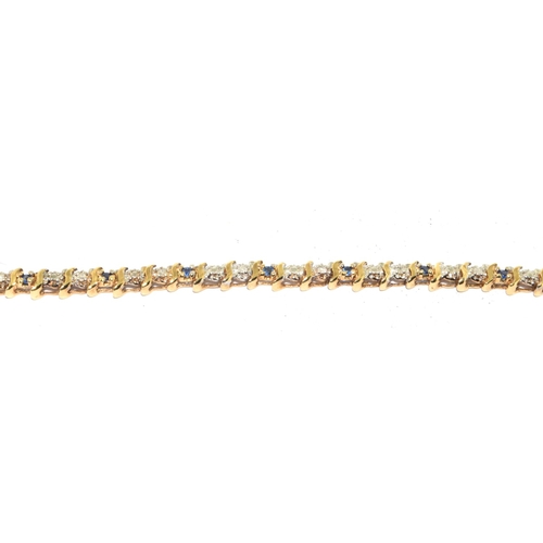 193 - 9ct gold Diamond and Sapphire line bracelet 20cm long 6.7g