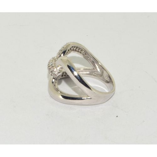 197 - Silver and CZ cross over ring size M