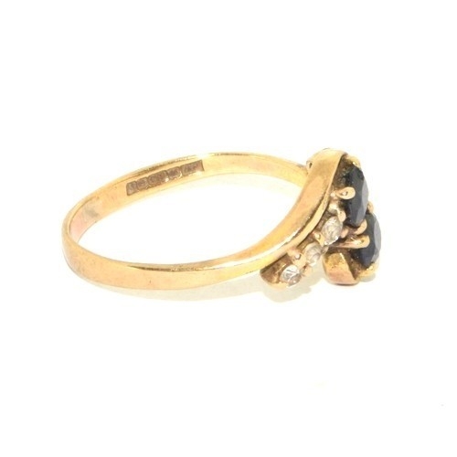 206 - 9ct gold ladies twin stone sapphire ring in a twist design with clear stone enhancement size Q