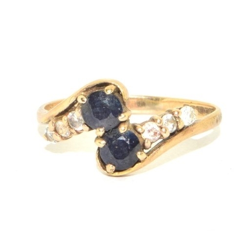 206 - 9ct gold ladies twin stone sapphire ring in a twist design with clear stone enhancement size Q