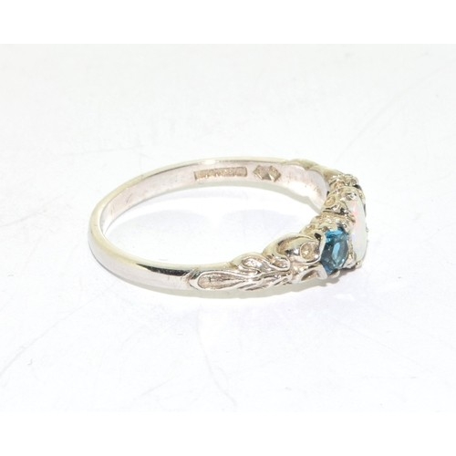 241 - 14ct white gold ladies vintage Opal and Sapphire triple ring in a scroll work setting size T