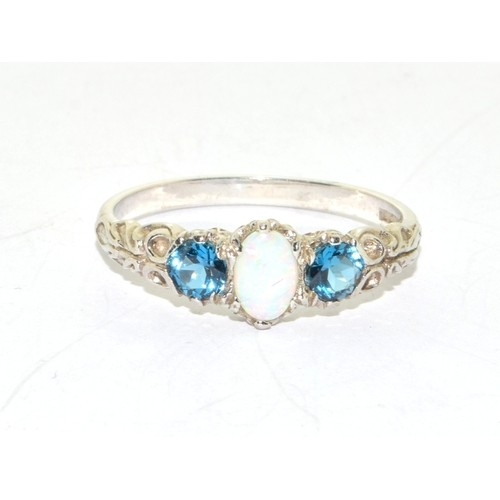 241 - 14ct white gold ladies vintage Opal and Sapphire triple ring in a scroll work setting size T