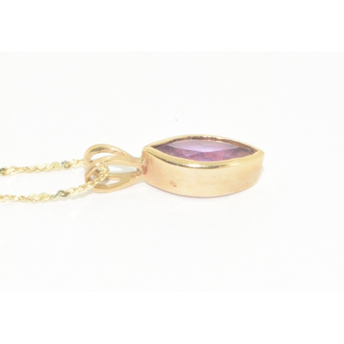 253 - 9ct gold Amethyst pendant necklace and 9ct gold Amethyst earrings the pendant on a 9ct gold chain of... 