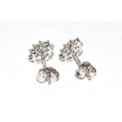 293 - 18ct white gold Tanzanite and Diamond cluster earrings