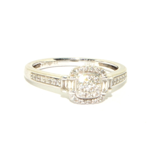 321 - Platinum ladies Diamond ring set in a halo pattern with both round and baguette cut diamonds and dia... 