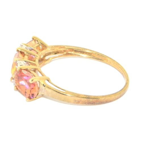 176 - 9ct gold ladies 3 stone amber colour Topaz ring with accent Diamonds size P