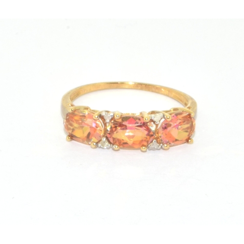 176 - 9ct gold ladies 3 stone amber colour Topaz ring with accent Diamonds size P