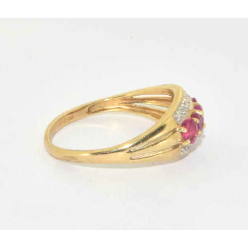 241 - Good 9ct gold ladies Ruby and Diamond 3 x row ring in a vintage design size U