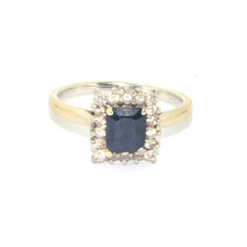 311 - 18ct white gold ladies good oblong Sapphire centre stone with a Diamond halo surround Statement 5.4g... 