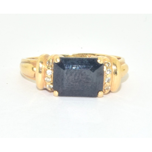 231 - 9ct gold ladies oblong Sapphire and Diamond ring, hall marked as diamond in the ring size N 