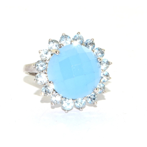 222 - 925 silver large size unpolished blue multi facetted Chrystal in a round halo design statement ring ... 