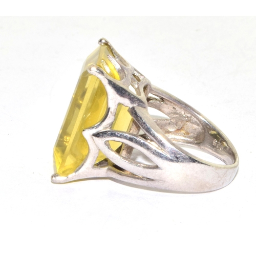 302 - 925 silver large oblong lemon Quarts single stone statement ring in an open work claw setting size O