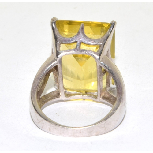 302 - 925 silver large oblong lemon Quarts single stone statement ring in an open work claw setting size O