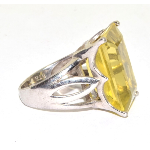 302 - 925 silver large oblong lemon Quarts single stone statement ring in an open work claw setting size O