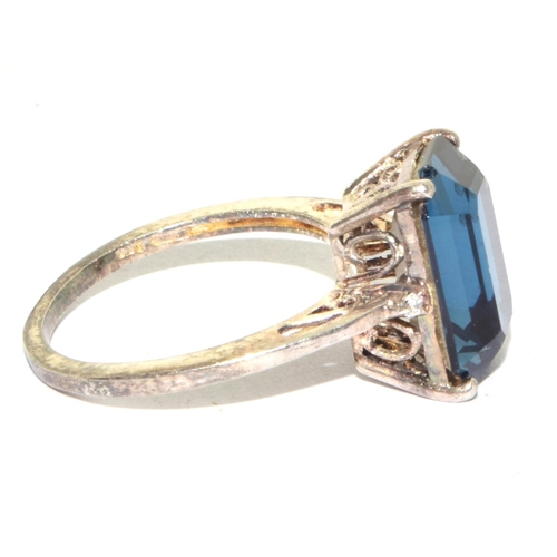 322 - 925 silver oblong emerald cut blue quarts ring in a scroll work setting size P