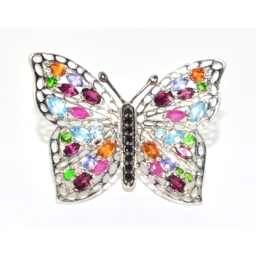 312 - Exotic 925 silver butterfly design ring with multi gem tone colouring wing span 4.5x4cm size O