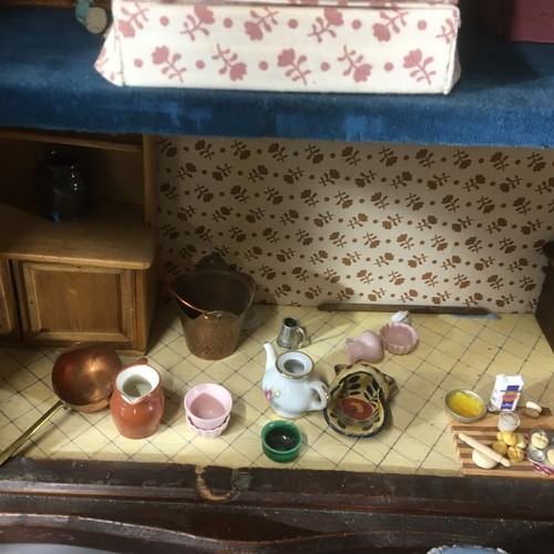 367 - Folk Art Style Dolls House and all associated Furniture and Miniatures.H 63cm x W 42cm x D 18cm... 