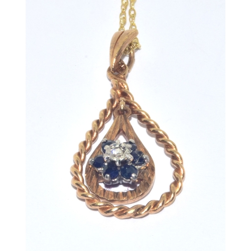 283 - 9ct gold vintage Sapphire and Diamond cluster pendant necklace on a 9ct gold chain measuring 44cm