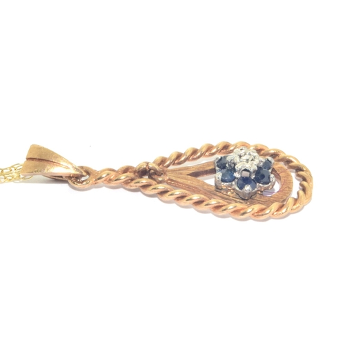 283 - 9ct gold vintage Sapphire and Diamond cluster pendant necklace on a 9ct gold chain measuring 44cm