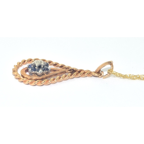 283 - 9ct gold vintage Sapphire and Diamond cluster pendant necklace on a 9ct gold chain measuring 44cm