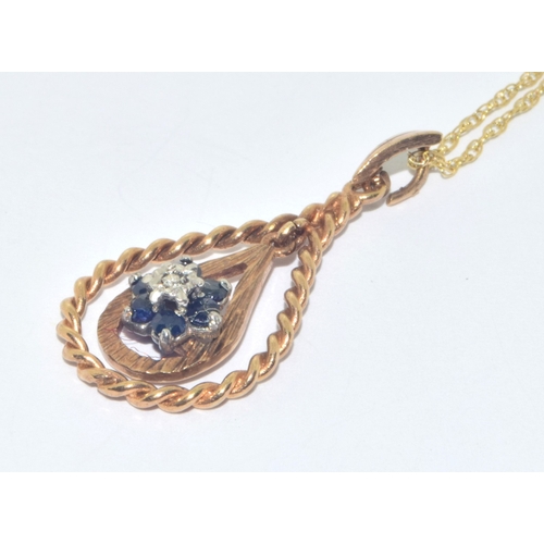 283 - 9ct gold vintage Sapphire and Diamond cluster pendant necklace on a 9ct gold chain measuring 44cm