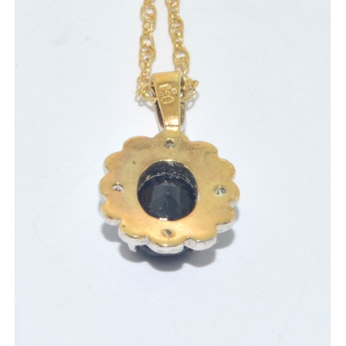 313 - 9ct gold Sapphire and Diamond cluster pendant necklace on a 9ct gold chain measuring 44cm