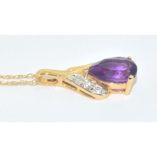 266 - 9ct gold Amethyst pendant necklace on a 9ct gold chain of 46cm