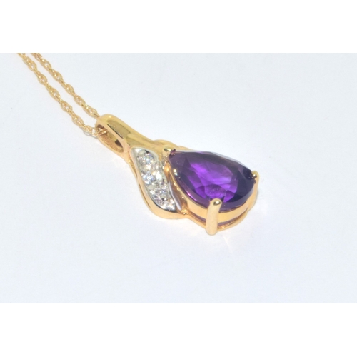 266 - 9ct gold Amethyst pendant necklace on a 9ct gold chain of 46cm