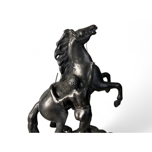 179 - A large Spelter Marley Horse figure.41 x 35cm