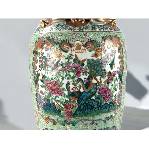 51 - A large Chinese porcelain Famille Verte floor vase.Qing dynasty, 19th century.Turquoise ground, fine... 
