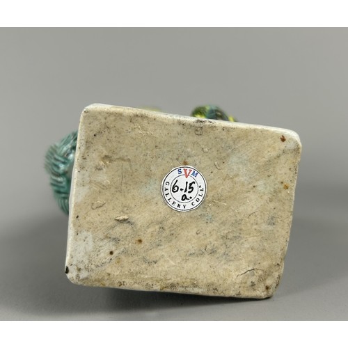 1 - A pair of Chinese Famille Verte porcelain Foo dogs.Qing dynasty, 19th century.Height - 22cm... 