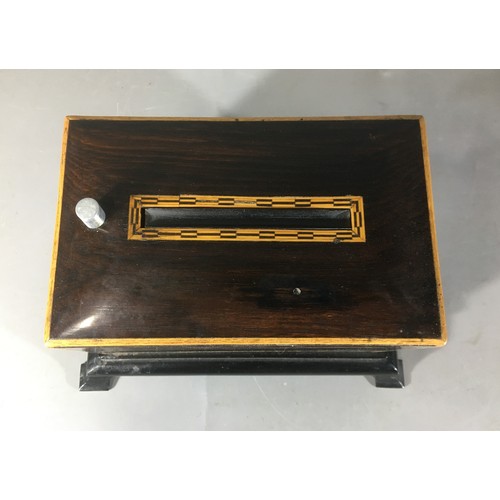 300 - Art Deco Rosewood Automatic Cigarette Dispenser on Ogee Base.