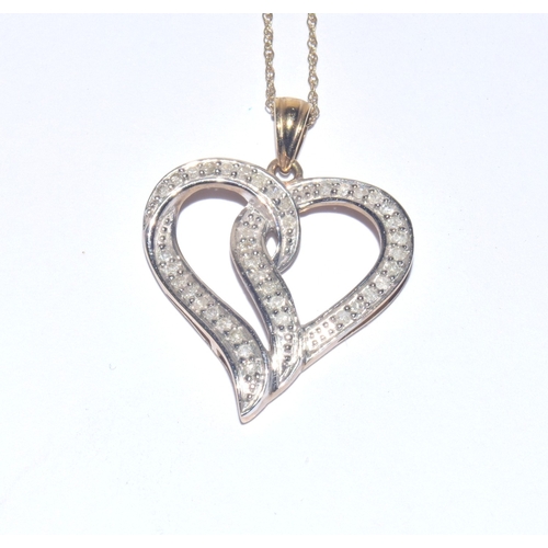 183 - 9ct gold Heart white gem stone pendant necklace on a 44cm long 9ct gold chain