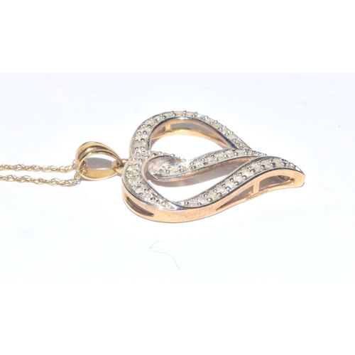 183 - 9ct gold Heart white gem stone pendant necklace on a 44cm long 9ct gold chain