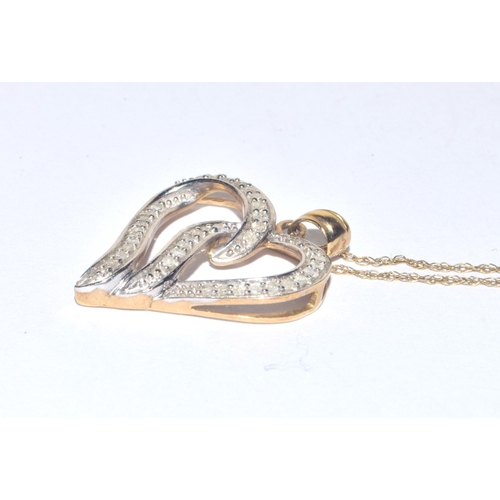 183 - 9ct gold Heart white gem stone pendant necklace on a 44cm long 9ct gold chain