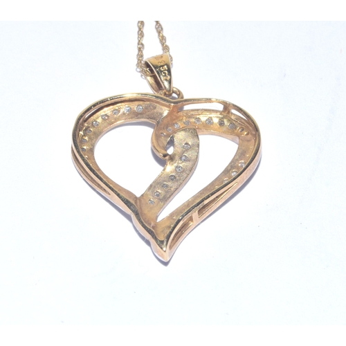 183 - 9ct gold Heart white gem stone pendant necklace on a 44cm long 9ct gold chain