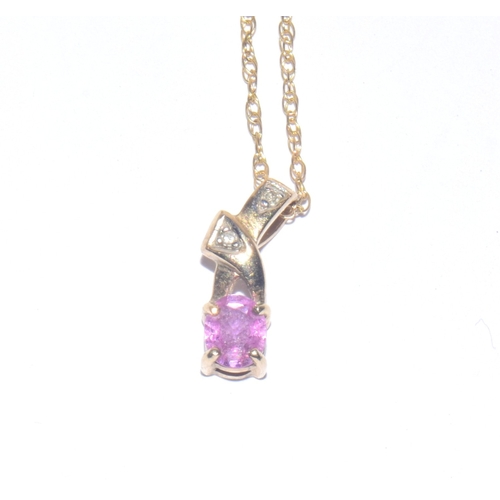 223 - 9ct gold oval cut Pink Sapphire and Diamond pendant necklace on a 44cm long 9ct gold chain