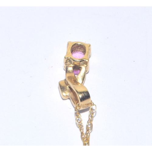 223 - 9ct gold oval cut Pink Sapphire and Diamond pendant necklace on a 44cm long 9ct gold chain