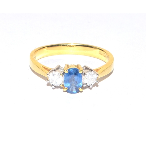 246 - 18ct gold ladies Diamond and Aquamarine blue stone triple ring in an open work setting size O