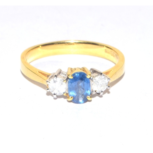 246 - 18ct gold ladies Diamond and Aquamarine blue stone triple ring in an open work setting size O