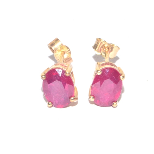 248 - 9ct gold oval cut Ruby stud earrings with gold posts 